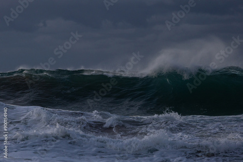 Big wave on the stormy ocean.