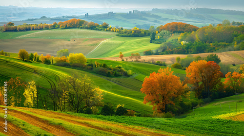 Rolling hills with changing crops and autumn trees panoramic view Change the harmony of nature's cycles