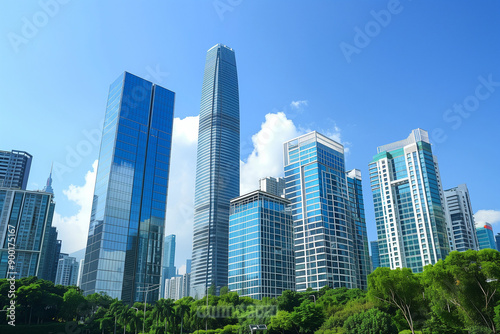 Skyscrapers Reaching into a Bright Blue Sky with White Clouds on a Sunny Day