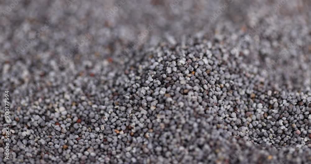 poppy seeds that are used in cooking and dessert production, scattered poppy seeds for cooking