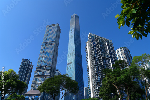 Skyscrapers Viewed from Below with Blue Sky and White Clouds