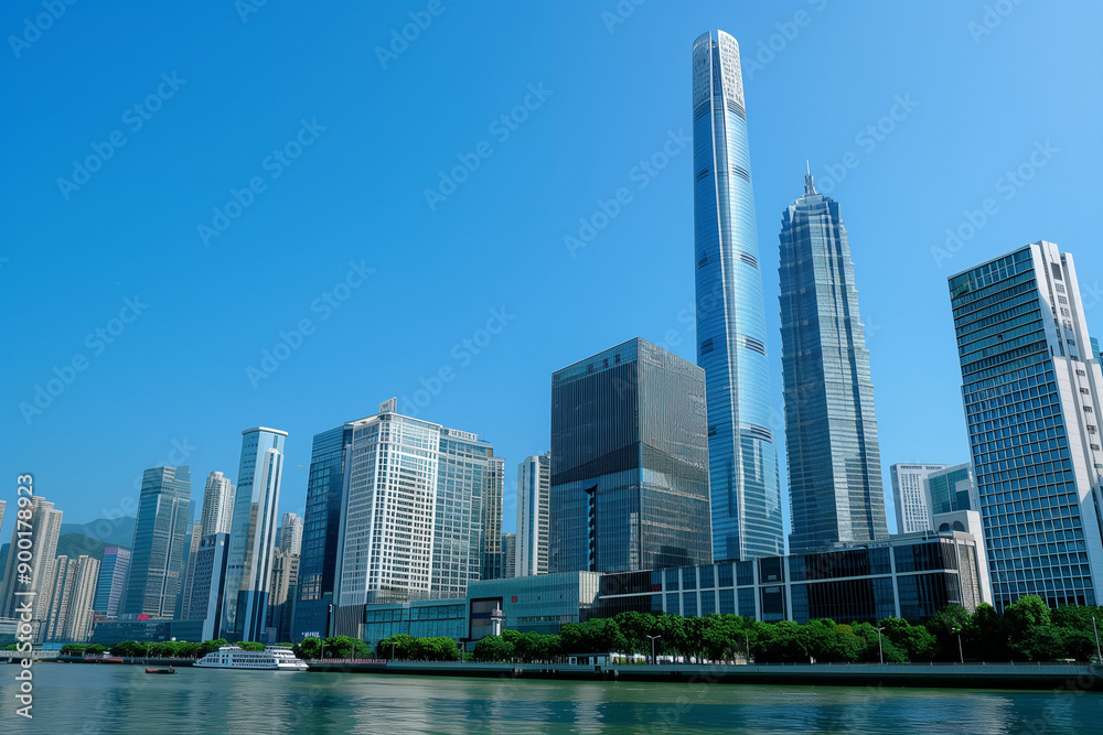 Fototapeta premium Skyscrapers Viewed from Below with Blue Sky and White Clouds