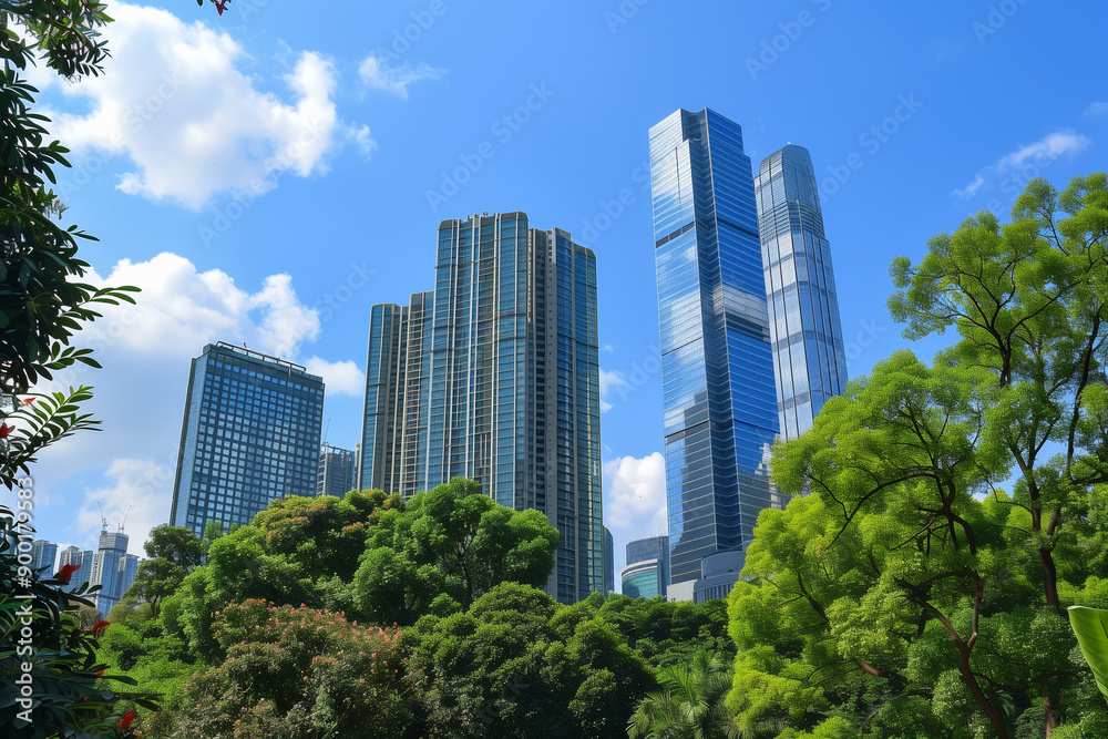 Skyscrapers Reaching into a Bright Blue Sky with White Clouds on a Sunny Day Skyscrapers Reaching into a Bright Blue Sky with White Clouds on a Sunny Day