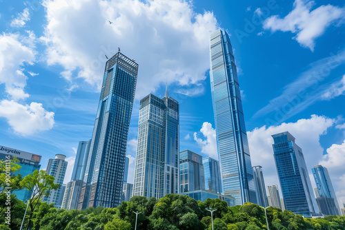 Skyscrapers Reaching into a Bright Blue Sky with White Clouds on a Sunny Day