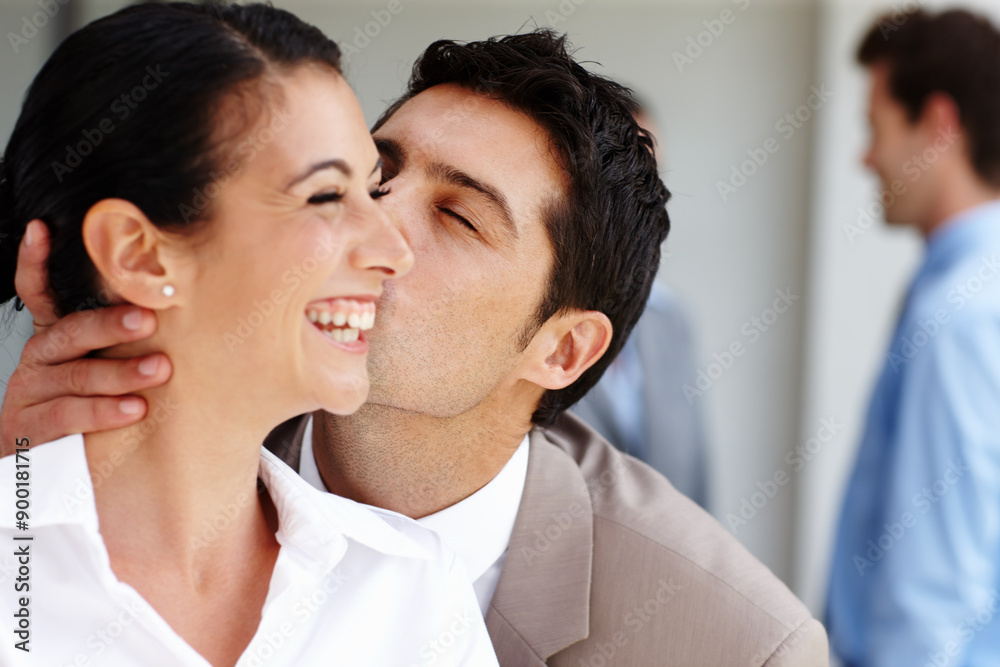 Couple, kiss and business with people in office, inappropriate behaviour and hr issue for working relationship. Employee, happy and hidden desire with love, passionate and romance in workplace Couple, kiss and business with people in office, inappropriate behaviour and hr issue for working relationship. Employee, happy and hidden desire with love, passionate and romance in workplace