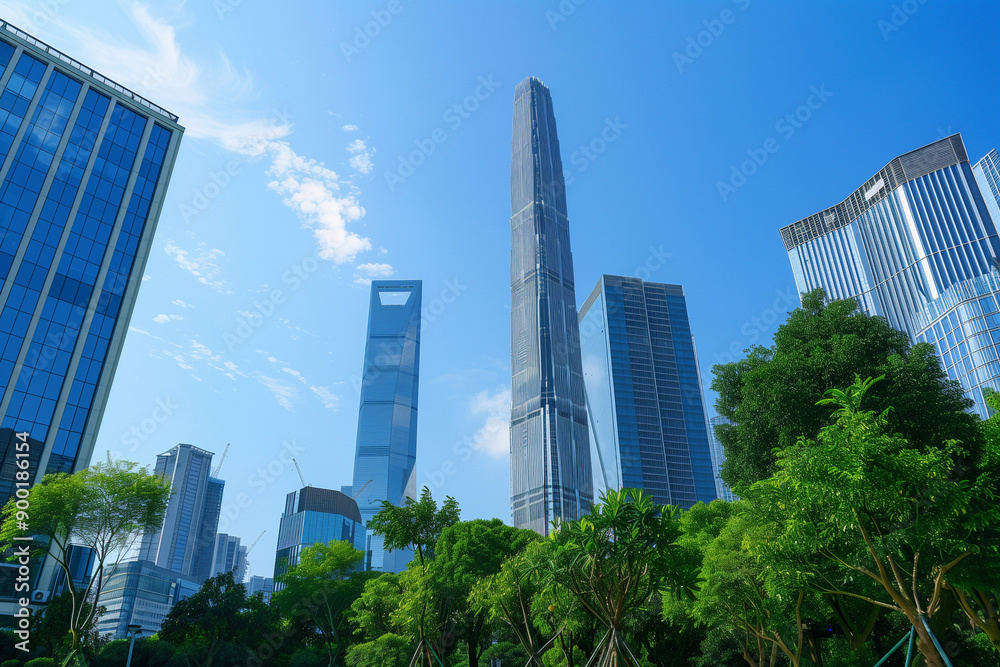 Skyscrapers Reaching into a Bright Blue Sky with White Clouds on a Sunny Day Skyscrapers Reaching into a Bright Blue Sky with White Clouds on a Sunny Day