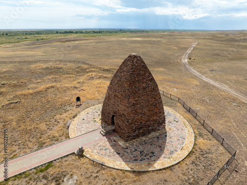 The four-sided mazar Kozy Korpesh and Bayan Sulu Mausoleum (VIII-X centuries) is built of flat stone, the building narrows upwards, forming a rounded top. East Kazakhstan region. photo