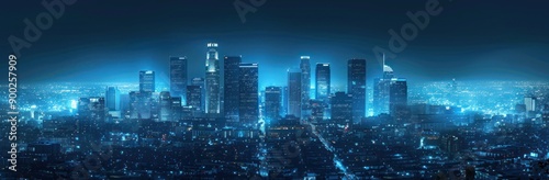 A view of a city skyline at night illuminated by blue lights