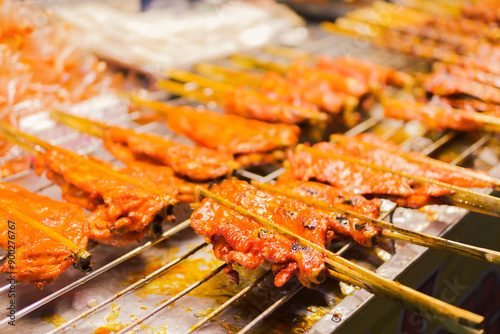 Thai style grilled chicken with blurred background