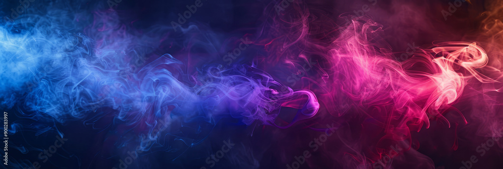 Fototapeta premium Colorful smoke swirls in shades of blue, pink and purple against a dark background. Mystical vibrant effect