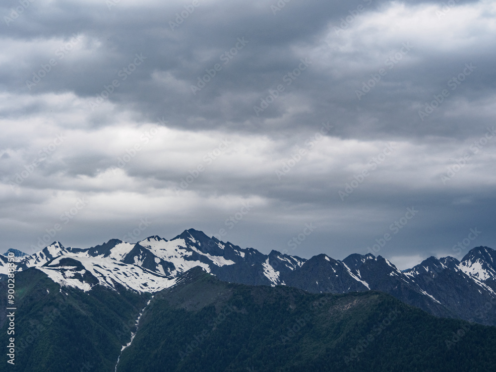A majestic mountain landscape with snow-capped peaks reflecting the bright rays of the sun and creating an atmosphere of tranquility A majestic mountain landscape with snow-capped peaks reflecting the bright rays of the sun and creating an atmosphere of tranquility