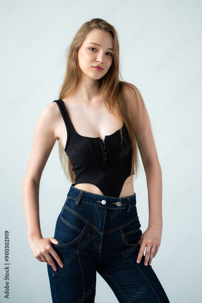 Woman wearing casual clothes poses on white background. Model agency snapshot Woman wearing casual clothes poses on white background. Model agency snapshot