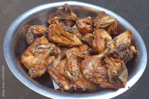 Golden brown fried chicken fresh meal from Indonesia called ayam goreng