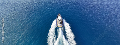 Aerial drone top down photo of  luxury inflatable rib speed boat cruising in mediterranean sea