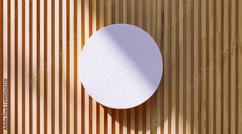 A white circle is mounted on the wooden wall of an outdoor space, creating a minimalist and modern atmosphere. A wooden wall hosts a circular mockup signboard. photo