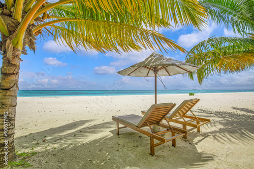 Beautiful panoramic sea sand sky. Tropical relax beach sunny summer island landscape. Love couple chairs umbrella palm leaves romantic coast. Luxury travel destination. Honeymoon vacation best tourism © icemanphotos