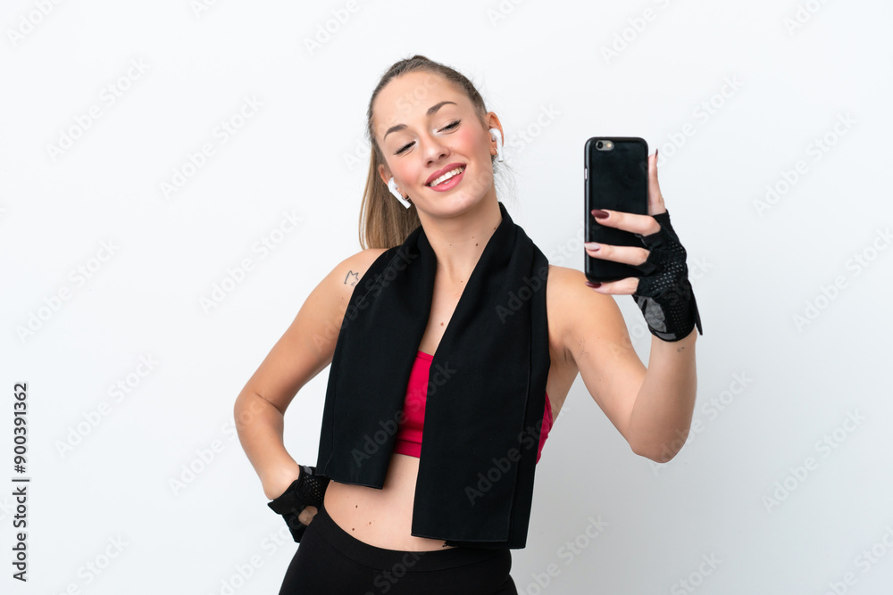 Young sport caucasian woman isolated on white background making a selfie Young sport caucasian woman isolated on white background making a selfie
