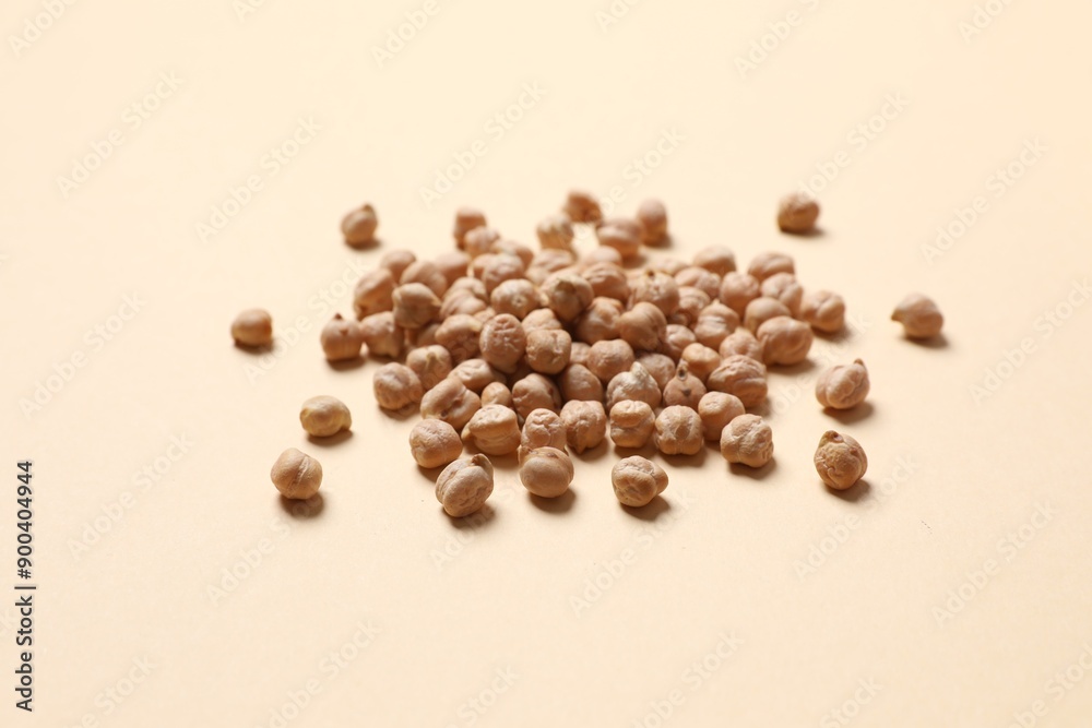 Raw chickpeas on colored background. Healthy and natural vegetarian food Raw chickpeas on colored background. Healthy and natural vegetarian food