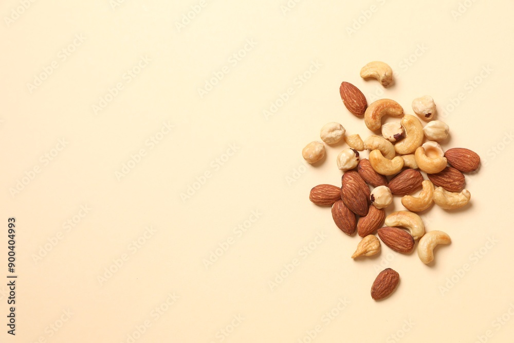 Mixed nuts on colored background Mixed nuts on colored background