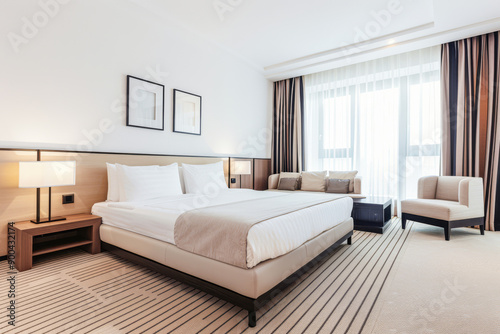 Luxurious hotel room interiors in warm tones with chic decor and natural lighting.