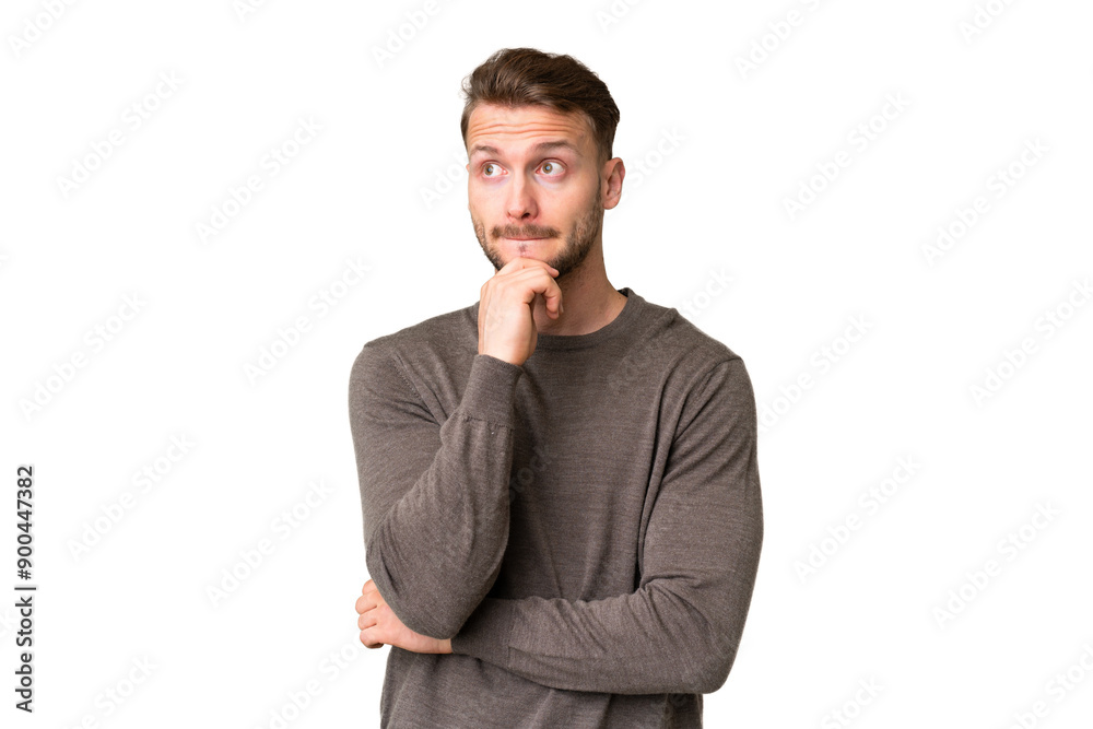 Young handsome caucasian man over isolated chroma key background having doubts and thinking Young handsome caucasian man over isolated chroma key background having doubts and thinking
