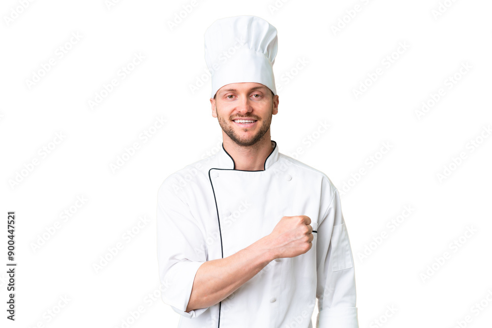 Young caucasian chef over isolated chroma key background celebrating a victory Young caucasian chef over isolated chroma key background celebrating a victory