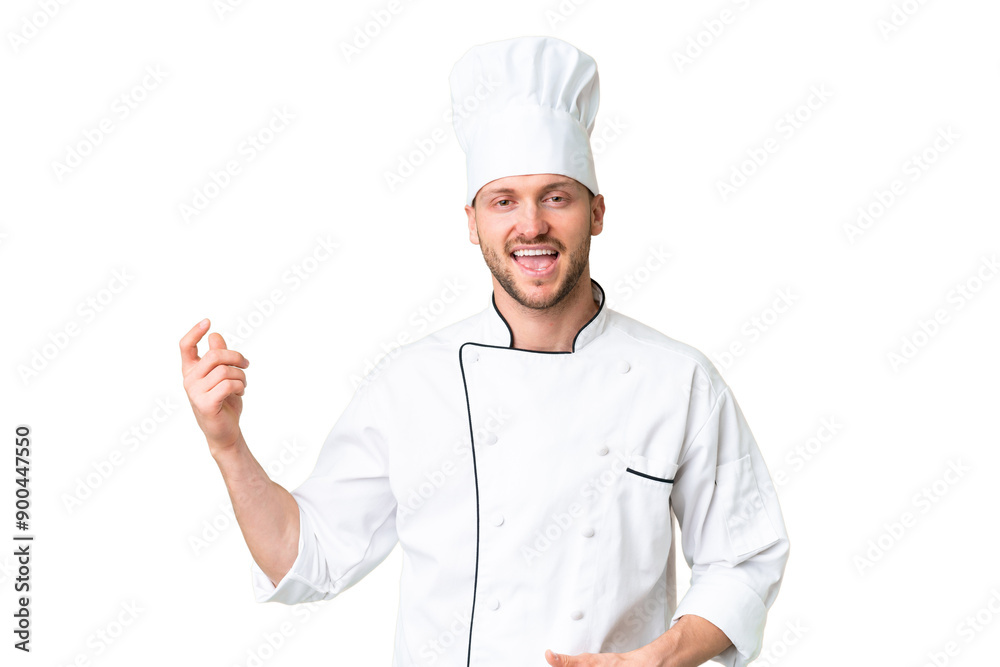 Young caucasian chef over isolated chroma key background making guitar gesture Young caucasian chef over isolated chroma key background making guitar gesture