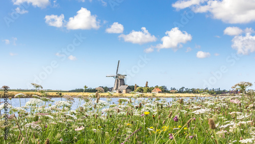 Dutch windmill Het Noorden at the wadden island Texel in the Netherlands.