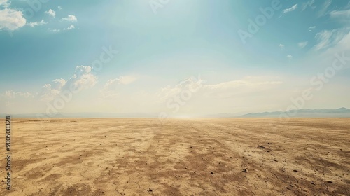 A barren, dusty landscape with no vegetation, providing plenty of space for text or graphics. photo