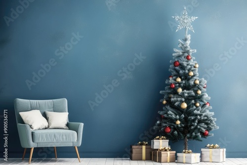 Elegant Christmas Tree Decorated With Ornaments and Gifts Beside Cozy Chair in a Tastefully Arranged Living Room © DailyStock