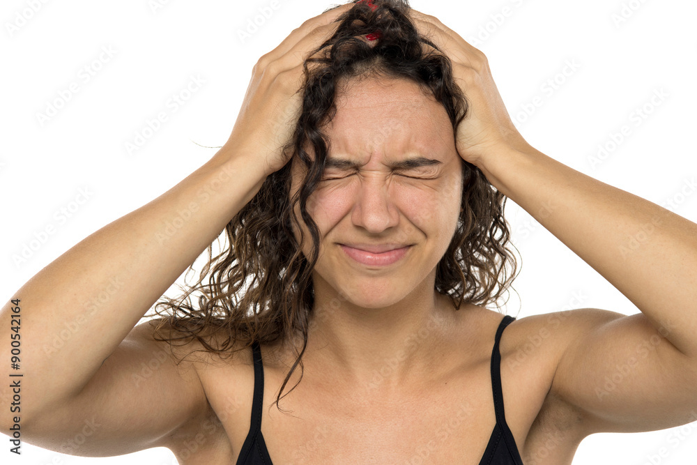 Exhausted young woman with eyes closed. Pain, stress and despai Exhausted young woman with eyes closed. Pain, stress and despai