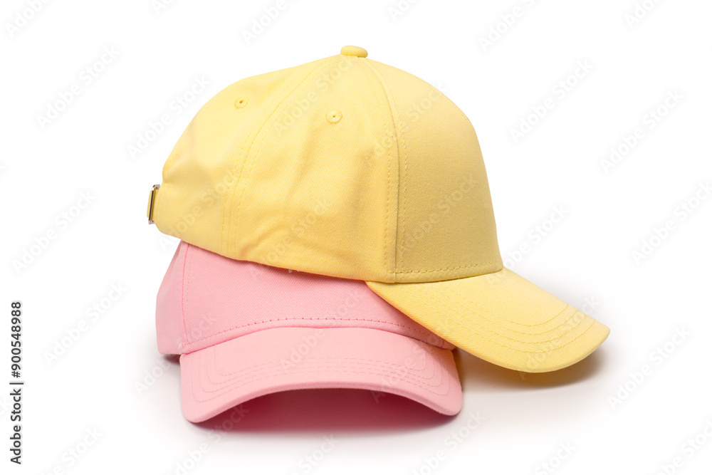 Fototapeta premium Pink and yellow cap isolated on white background.