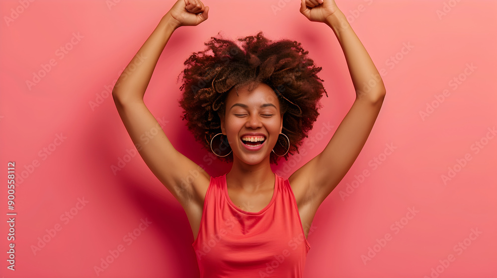 Woman celebrates triumph with arms raised high in victory, showcasing strength and confidence. Woman celebrates triumph with arms raised high in victory, showcasing strength and confidence.