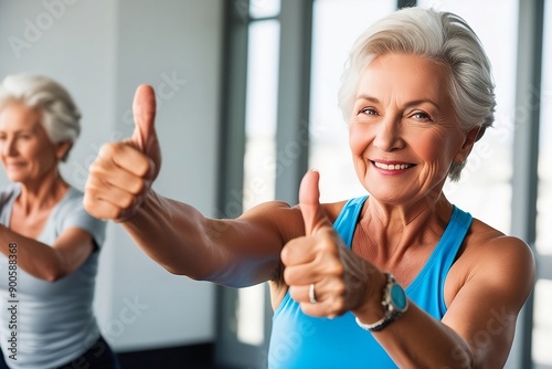 Thumbs Up: Celebrating the Spirit of Tenacity and Unwavering Determination.
image features an elderly Indian woman giving a thumbs up sign, embodying the spirit of resilience and determination. photo