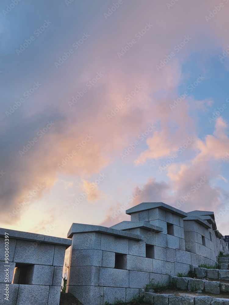 Blue sky with fluffy clouds. pink cumulus clouds before sunset. Korea Blue sky with fluffy clouds. pink cumulus clouds before sunset. Korea