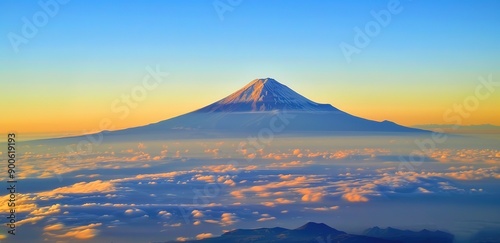 a mountain peak surrounded by a sea of ​​white clouds with a sunset in the background