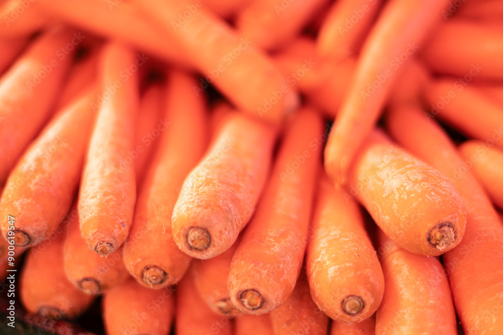 many fresh organic carrots on market counter many fresh organic carrots on market counter