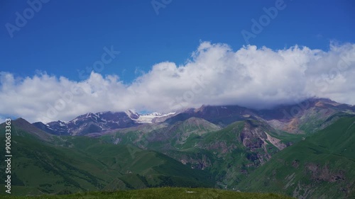 Wallpaper Mural Beautiful summer landscape with fast moving clouds in Caucasus Mountains, Kazbegi timelapse 4k Torontodigital.ca