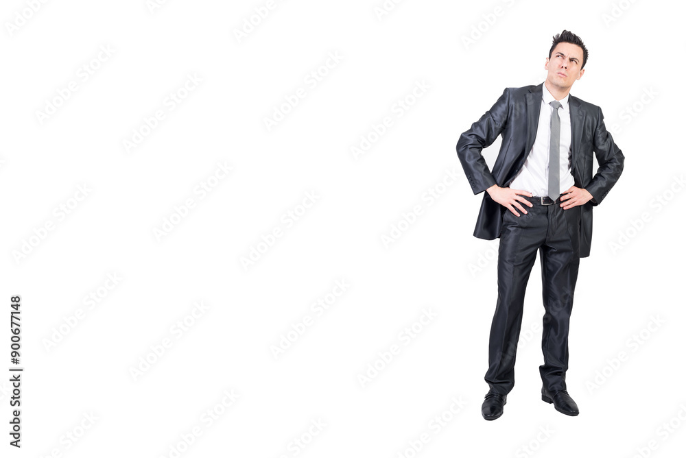 Thoughtful man in formal suit keeping hands on waist Thoughtful man in formal suit keeping hands on waist