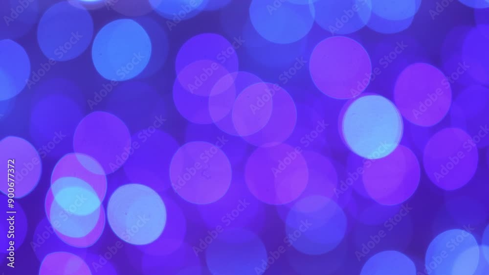 Bokeh, Festive abstract Christmas texture, purple bokeh particles and highlights on dark background Bokeh, Festive abstract Christmas texture, purple bokeh particles and highlights on dark background