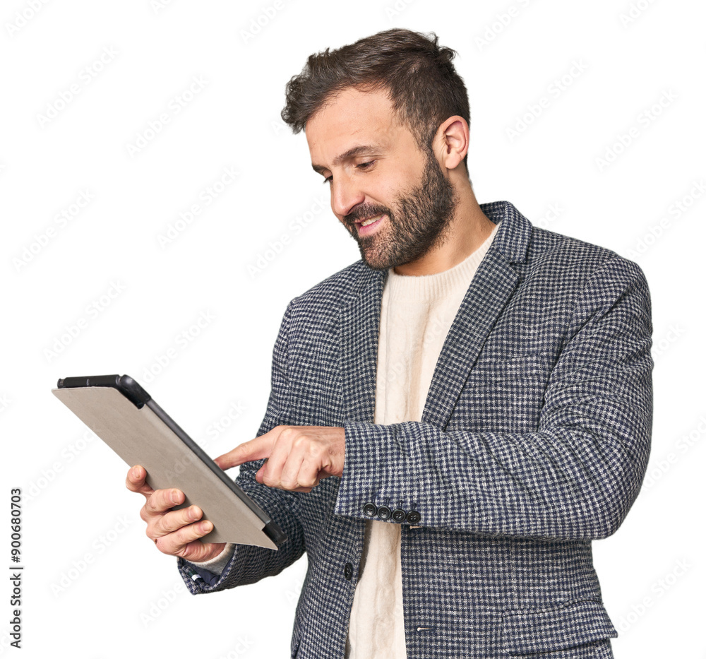 Hispanic male businessman with tablet in studio Hispanic male businessman with tablet in studio