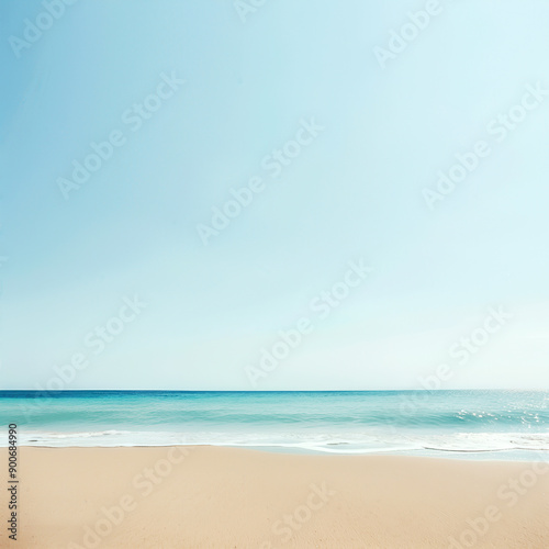 Pristine sandy beach with a clear blue sky and turquoise ocean waves, capturing the tranquility and beauty of a serene coastal landscape. high quality.