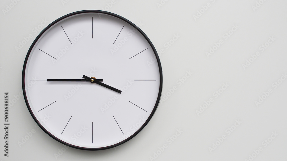 Wall Clock Showing 15.45/03.45 O'Clock on White Wooden Surface - Perfect for Time Management and Scheduling Concepts Wall Clock Showing 15.45/03.45 O'Clock on White Wooden Surface - Perfect for Time Management and Scheduling Concepts