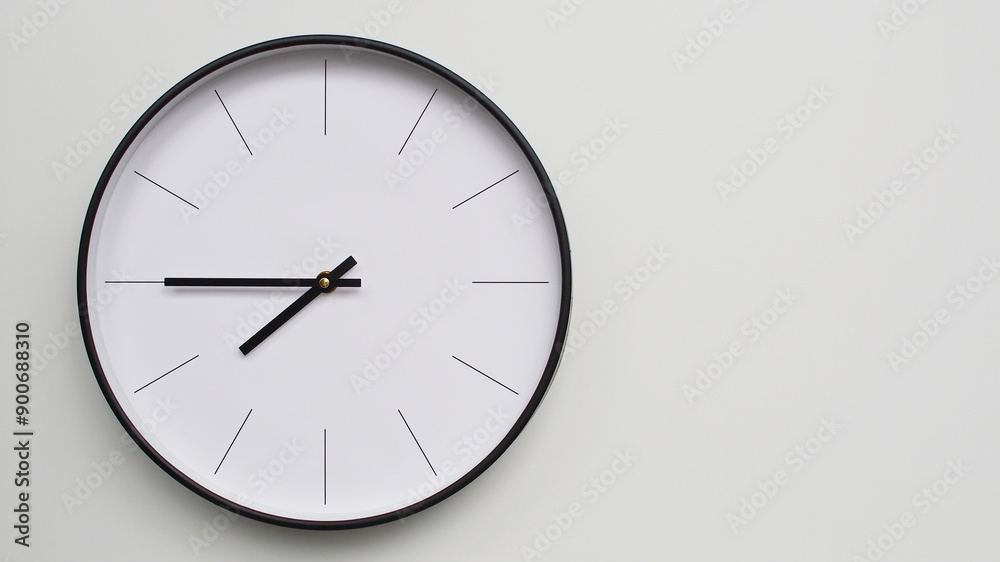 Wall Clock Showing 19.45/07.45O'Clock on White Wooden Surface - Perfect for Time Management and Scheduling Concepts Wall Clock Showing 19.45/07.45O'Clock on White Wooden Surface - Perfect for Time Management and Scheduling Concepts