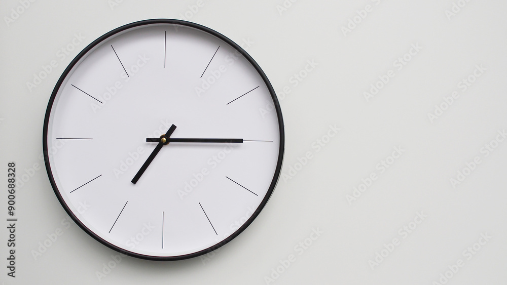 Wall Clock Showing 19.15/07.15 O'Clock on White Wooden Surface - Perfect for Time Management and Scheduling Concepts Wall Clock Showing 19.15/07.15 O'Clock on White Wooden Surface - Perfect for Time Management and Scheduling Concepts