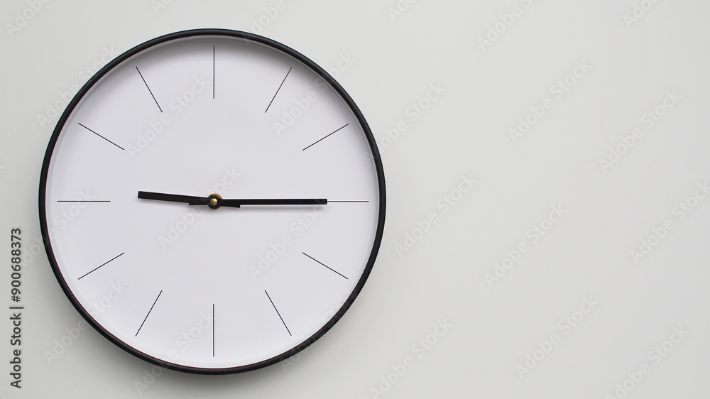 Wall Clock Showing 21.15/09.15 O'Clock on White Wooden Surface - Perfect for Time Management and Scheduling Concepts Wall Clock Showing 21.15/09.15 O'Clock on White Wooden Surface - Perfect for Time Management and Scheduling Concepts