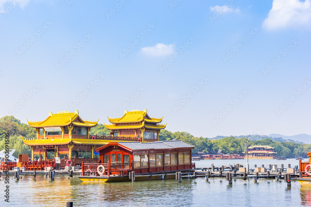Cruise boats in traditional chinese style at the jetty in Hangzhou, China