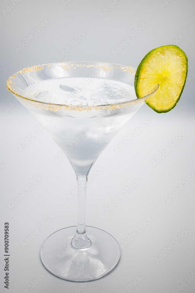 Alcoholic cocktail in a martini glass.
Alcoholic cocktail in a martini glass.