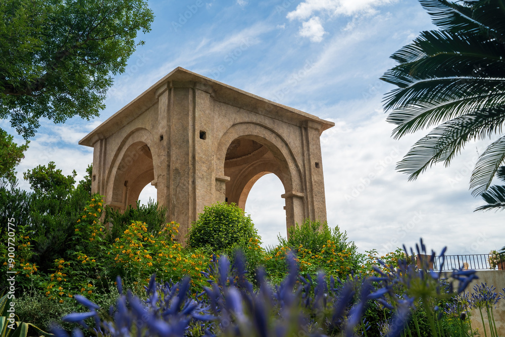Historical Stone Structure Surrounded by Lush Greenery