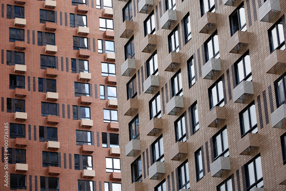 New residential buildings with boxes for air conditioners. House development, high-rise construction New residential buildings with boxes for air conditioners. House development, high-rise construction